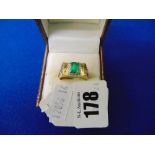 A 14ct gold Emerald and diamond ring,