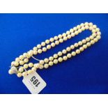 A Two row uniform Pearl necklace,