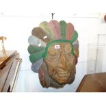 A carved Native American head