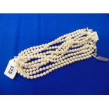 Five White cultured Pearl necklaces approx.