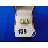 A 14ct gold Emerald and diamond ring,