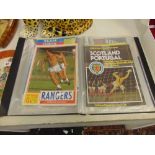 A qty of football programmes