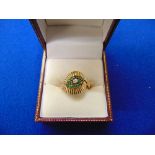 An 14ct gold, Diamond and Emerald ring,