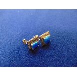 Pair of Silver square earrings, with blue OPals,