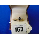 An 18ct gold, Diamond and Sapphire ring,