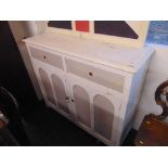 A Pine two door/ two drawer kitchen cabinet