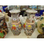 A pair of hexagonal porcelain vases