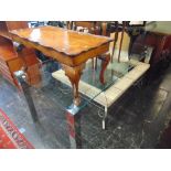 A glass top dining table