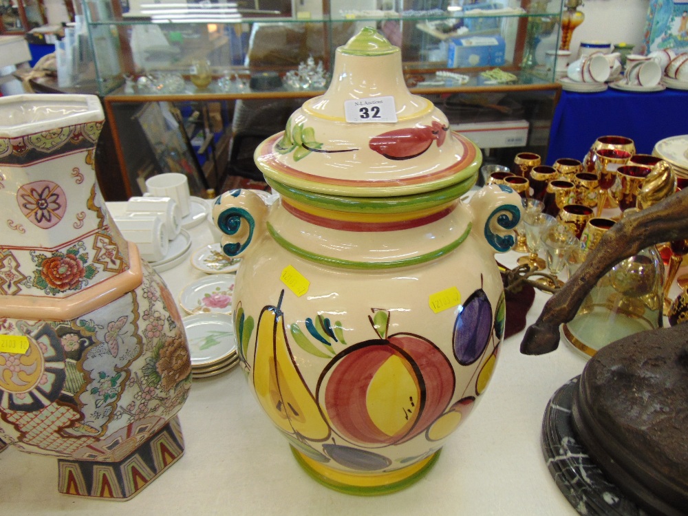 A large pottery lidded vase