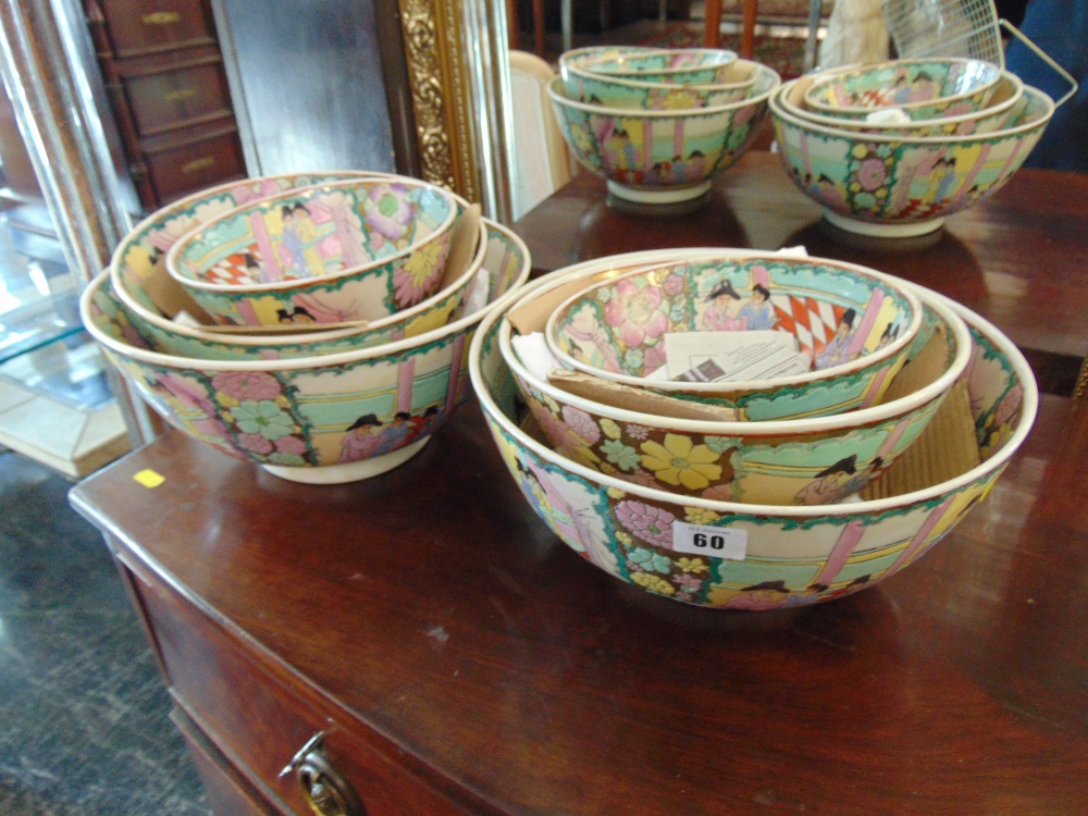 Two sets of Canton style fruit bowls