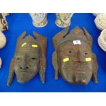 Two wooden carved masks