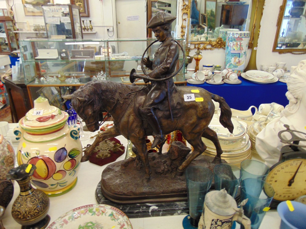 A bronze Huntsman on Horseback