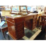 A Mahogany partners desk,