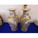 A pair of small Canton style vases