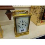 A brass carriage clock,