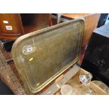 A brass tray,