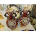 A pair of pottery vases,