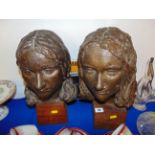 Two sculptured ladies heads,