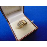 A 9ct Gold and Diamond trinity ring