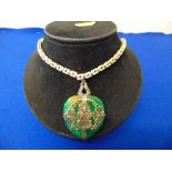 A Jade heart pendant on silver gilt chain