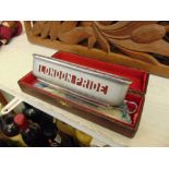 A Harmonica in case