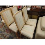 Eight limed Oak upholstered dining chairs