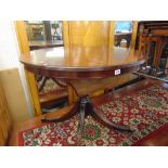 A Reproduction Regency style dining table