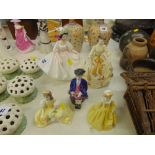A collection of five Royal Doulton figures