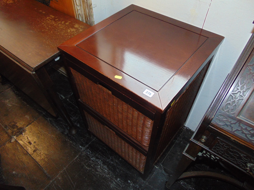 A Mahogany and rattan two drawer cabinet