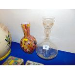 A decanter and End of day vase