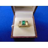 A 14ct gold Emerald and diamond ring,