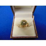 An 14ct gold, Diamond and Emerald ring,