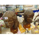 Two sculptured ladies heads,