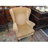 A Parker Knoll wing armchair