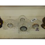 Four mini crystal Scottish clocks,
