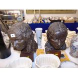 Two sculptured ladies heads,