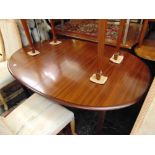 A Danish Oval mid-century dining table