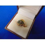 An 14ct gold, Diamond and Emerald ring,
