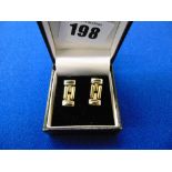 Pair of 18ct Gold stud earrings