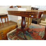 An Antique Mahogany cross banded tea table