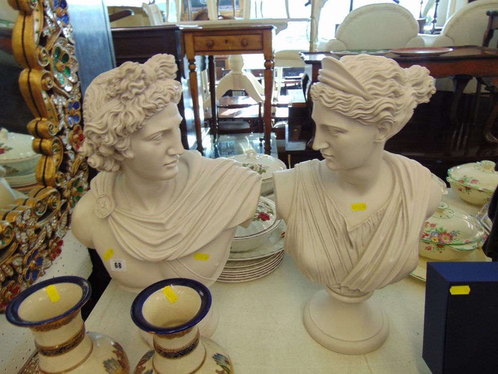 A pair of marbled busts Apollo and Diana