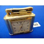 A Colibri vintage clock lighter