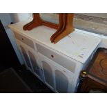 A Pine two door/ two drawer kitchen cabinet