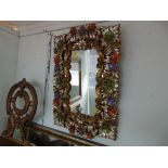 A decorative Oriental style mirror