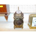 A brass mantle clock