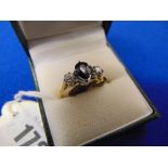 An 18ct gold, Diamond and Sapphire ring,