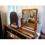 Two Victorian swing toilet mirrors