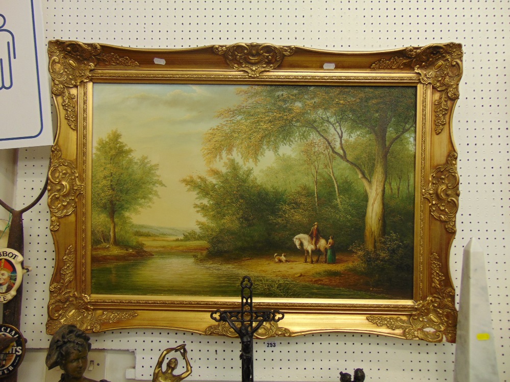 A gilt framed country scene,