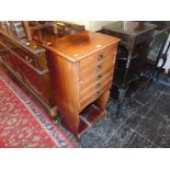 A mahogany music cabinet a.