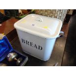 An enamel bread bin